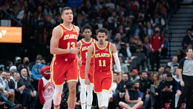 Apr 5, 2022; Toronto, Ontario, CAN; Atlanta Hawks guard Trae Young (11) reacts during the fourth quarter against Toronto Raptors at Scotiabank Arena.